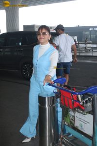 actress Rubina Dilaik in white and blue dress at mumbai airport