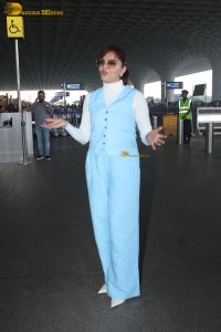 actress Rubina Dilaik in white and blue dress at mumbai airport