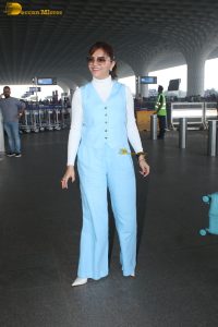 actress Rubina Dilaik in white and blue dress at mumbai airport
