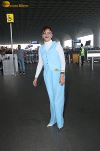 actress Rubina Dilaik in white and blue dress at mumbai airport