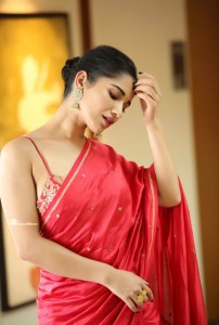 Actress Ruhani Sharma poses sensually in a Red Saree