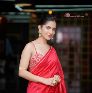 Actress Ruhani Sharma poses sensually in a Red Saree