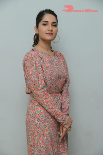 Telugu Actress Ruhani Sharma photoshoot in a orange dress