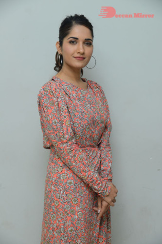 Telugu Actress Ruhani Sharma photoshoot in a orange dress