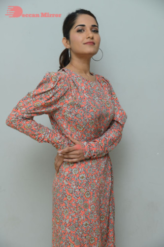 Telugu Actress Ruhani Sharma photoshoot in a orange dress