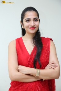 actress Rukmini Vasanth ravishing in a red saree
