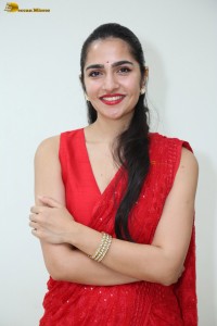 actress Rukmini Vasanth ravishing in a red saree