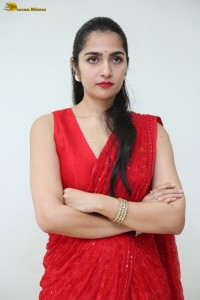 actress Rukmini Vasanth ravishing in a red saree