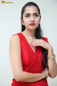 actress Rukmini Vasanth ravishing in a red saree