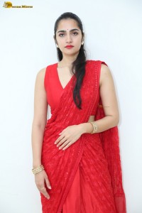 actress Rukmini Vasanth ravishing in a red saree