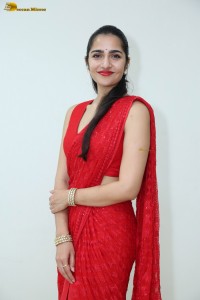 actress Rukmini Vasanth ravishing in a red saree
