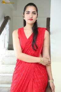 actress Rukmini Vasanth ravishing in a red saree