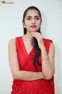 actress Rukmini Vasanth ravishing in a red saree