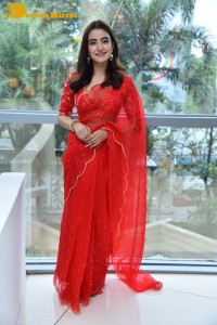 Actress Rukshar Dhillon in a Red Saree