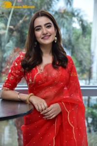 Actress Rukshar Dhillon in a Red Saree