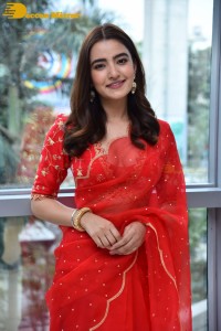 Actress Rukshar Dhillon in a Red Saree