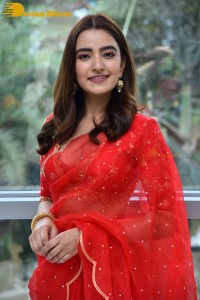 Actress Rukshar Dhillon in a Red Saree