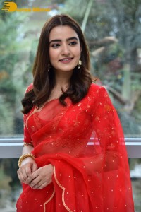 Actress Rukshar Dhillon in a Red Saree