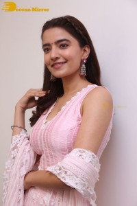 Actress Rukshar Dhillon in a pink dress
