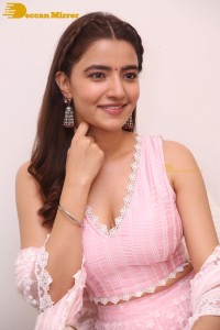 Actress Rukshar Dhillon in a pink dress