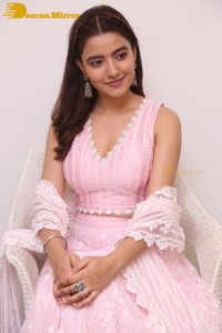 Actress Rukshar Dhillon in a pink dress