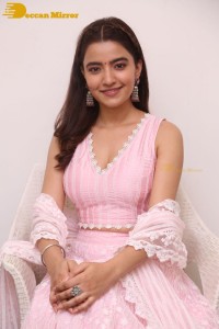 Actress Rukshar Dhillon in a pink dress