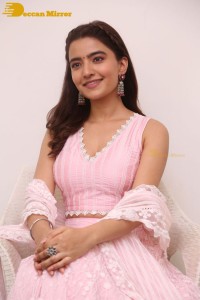 Actress Rukshar Dhillon in a pink dress