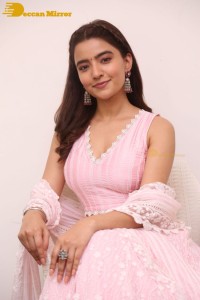 Actress Rukshar Dhillon in a pink dress