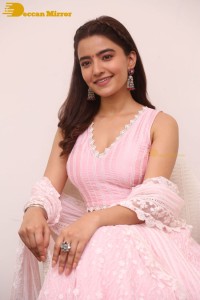 Actress Rukshar Dhillon in a pink dress