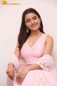 Actress Rukshar Dhillon in a pink dress