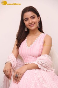 Actress Rukshar Dhillon in a pink dress