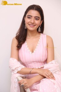Actress Rukshar Dhillon in a pink dress