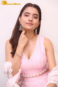 Actress Rukshar Dhillon in a pink dress