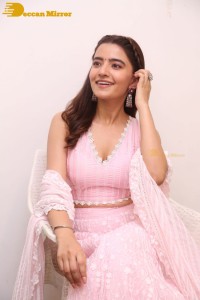 Actress Rukshar Dhillon in a pink dress