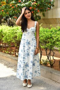 actress Rupa Srinivas sexy in a white and blue dress