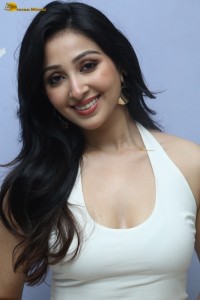 actress Sahiba Bhasin in a white top and mini skirt