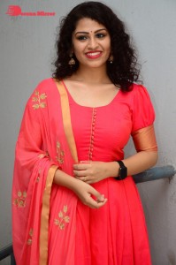 Model turned Actress Sai Keerthana Swargam in Red Salwar Kameez posing for a photoshoot