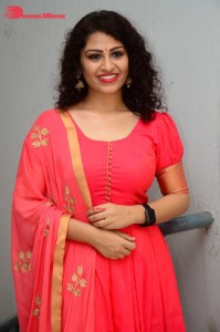 Model turned Actress Sai Keerthana Swargam in Red Salwar Kameez posing for a photoshoot