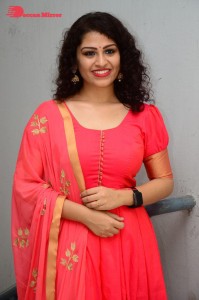 Model turned Actress Sai Keerthana Swargam in Red Salwar Kameez posing for a photoshoot