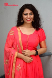 Model turned Actress Sai Keerthana Swargam in Red Salwar Kameez posing for a photoshoot