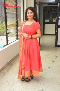 Model turned Actress Sai Keerthana Swargam in Red Salwar Kameez posing for a photoshoot