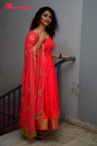 Model turned Actress Sai Keerthana Swargam in Red Salwar Kameez posing for a photoshoot