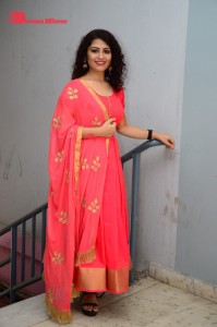 Model turned Actress Sai Keerthana Swargam in Red Salwar Kameez posing for a photoshoot