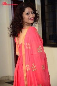 Model turned Actress Sai Keerthana Swargam in Red Salwar Kameez posing for a photoshoot