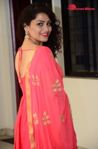 Model turned Actress Sai Keerthana Swargam in Red Salwar Kameez posing for a photoshoot