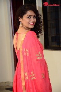 Model turned Actress Sai Keerthana Swargam in Red Salwar Kameez posing for a photoshoot