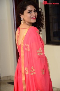 Model turned Actress Sai Keerthana Swargam in Red Salwar Kameez posing for a photoshoot