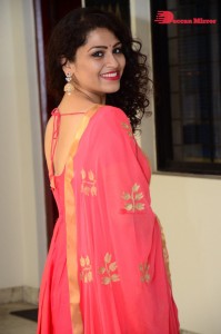 Model turned Actress Sai Keerthana Swargam in Red Salwar Kameez posing for a photoshoot