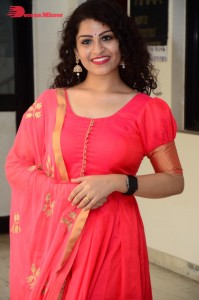 Model turned Actress Sai Keerthana Swargam in Red Salwar Kameez posing for a photoshoot