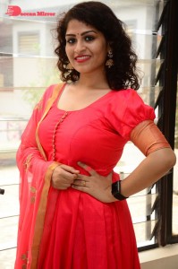 Model turned Actress Sai Keerthana Swargam in Red Salwar Kameez posing for a photoshoot